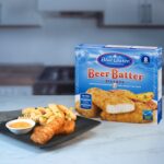 Plate of Beer Batter Fish Fillets and fries presented next to packaging