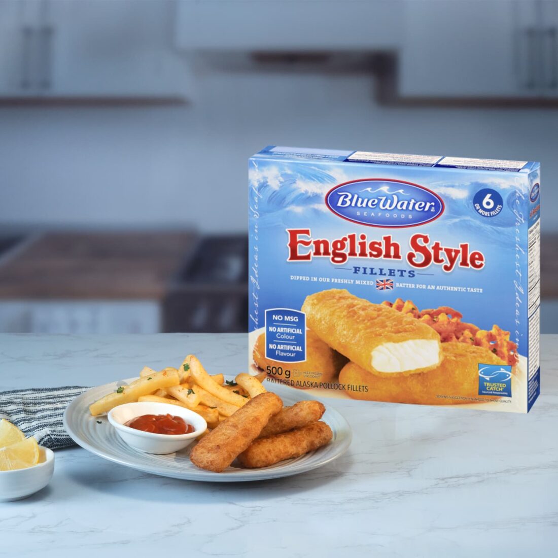 Plate of English Style Fillets and fries presented next to packaging